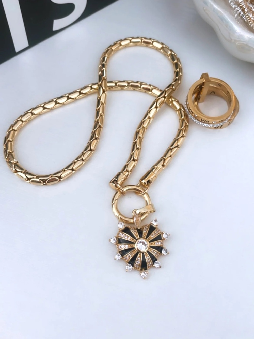 Gold Chain Necklace with Black Sunburst Pendant - Unbranded